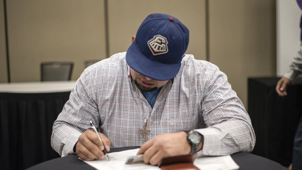 A jobseeker fills out an application during a National Career Fairs event in Austin, Texas, in December 2017. Despite the rise in joblessness, the figures remained below a key level, indicating a strong labour market. Photo: Bloomberg