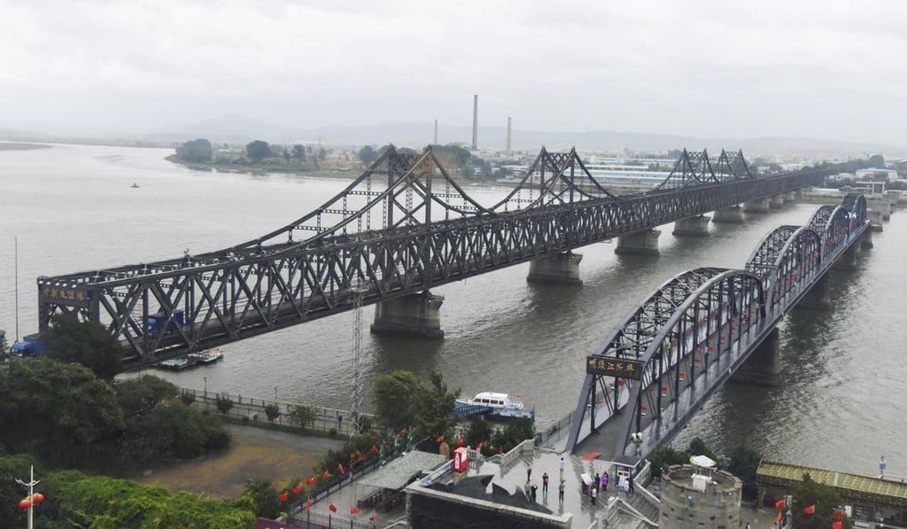 A file picture of the Sino-Korean Friendship Bridge (left) on the border between China and North Korea at Dandong. Photo: Kyodo