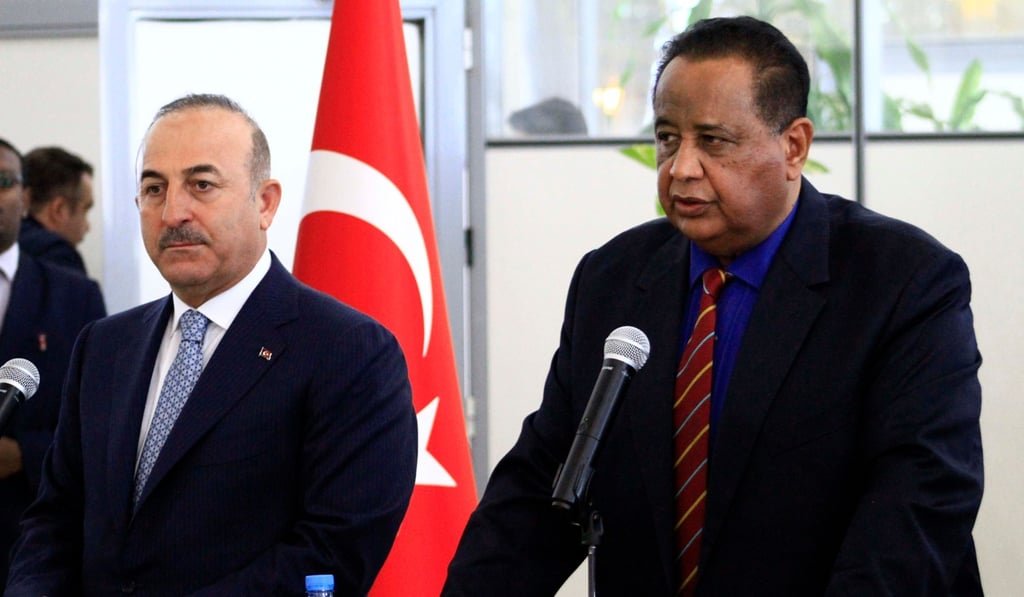 Sudanese Foreign Minister Ibrahim Ghandour, right, gives a press conference with his Turkish counterpart Mevlut Cavusoglu at Khartoum International Airport. Photo: AFP Sudanese Foreign Minister Ibrahim Ghandour, right, gives a press conference with his Turkish counterpart Mevlut Cavusoglu at Khartoum International Airport. Photo: AFP