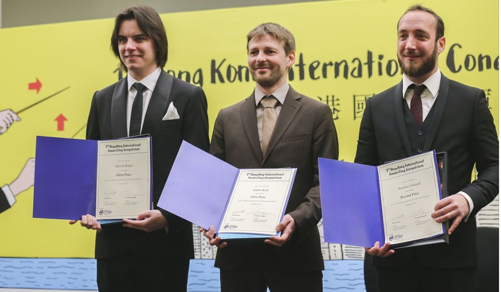 Kali (centre) came in ahead of Antoine Glatard (right) of France and Dawid Runtz (left) of Poland, who took second and third place respectively. Photo: Dickson Lee