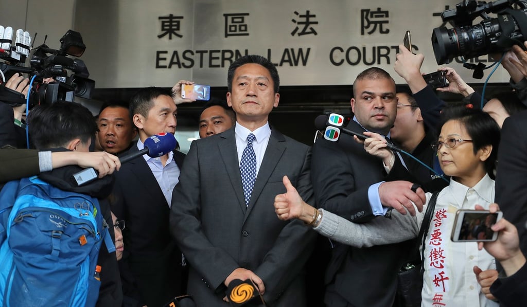 Retired police superintendent Frankly Chu King-wai (centre) leaving the Eastern Court. Photo: Winson Wong