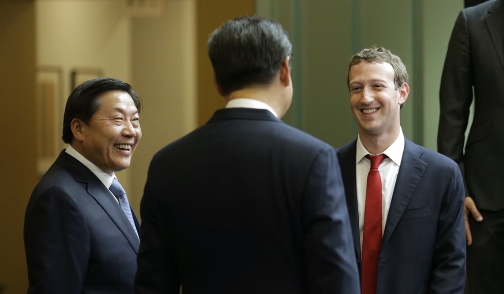 President Xi Jinping (centre) talks with Facebook CEO Mark Zuckerberg at Microsoft's main campus in Washington state in 2015. Photo: AP