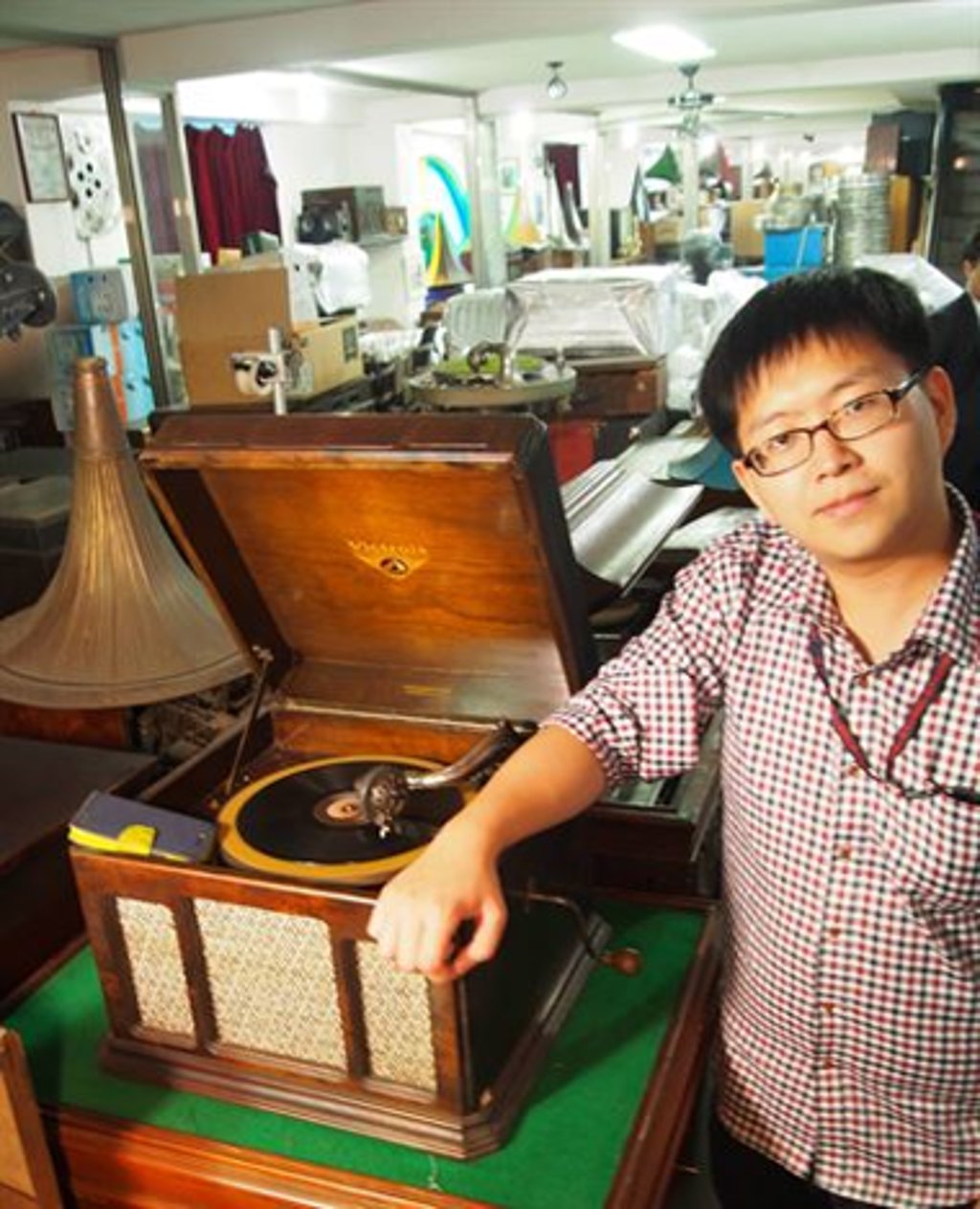 Suk Ji-hoon checks out a vintage Japanese Victor J1-51 phonograph/gramophone from the mid-1930s, in storage at Chamsori Museum in Gangneung. Photo: Suk Ji-hoon