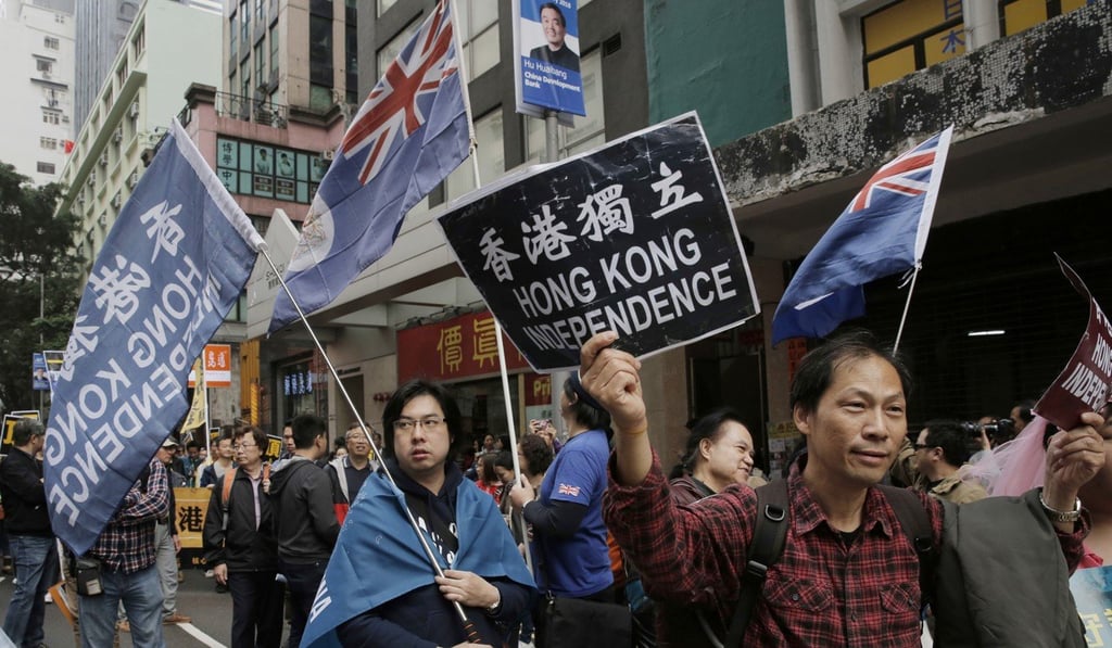 The Hong Kong colonial flag has become a symbol of protest. Photo: AP