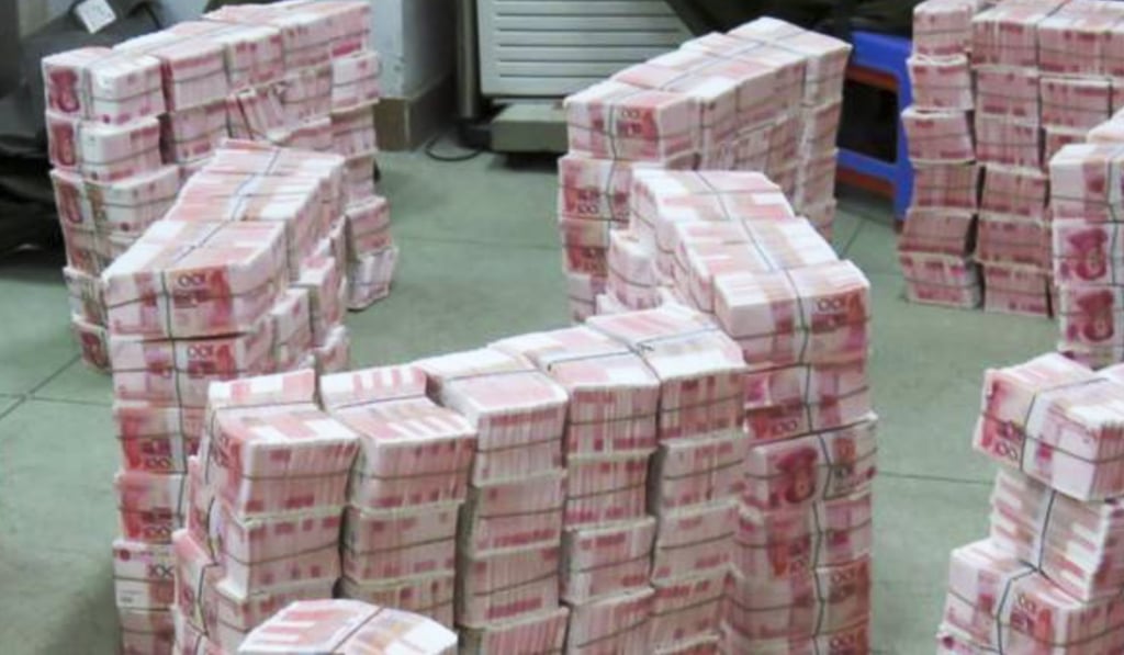 Fake notes seized by the police in Guangdong. Photo: Chinanews.com