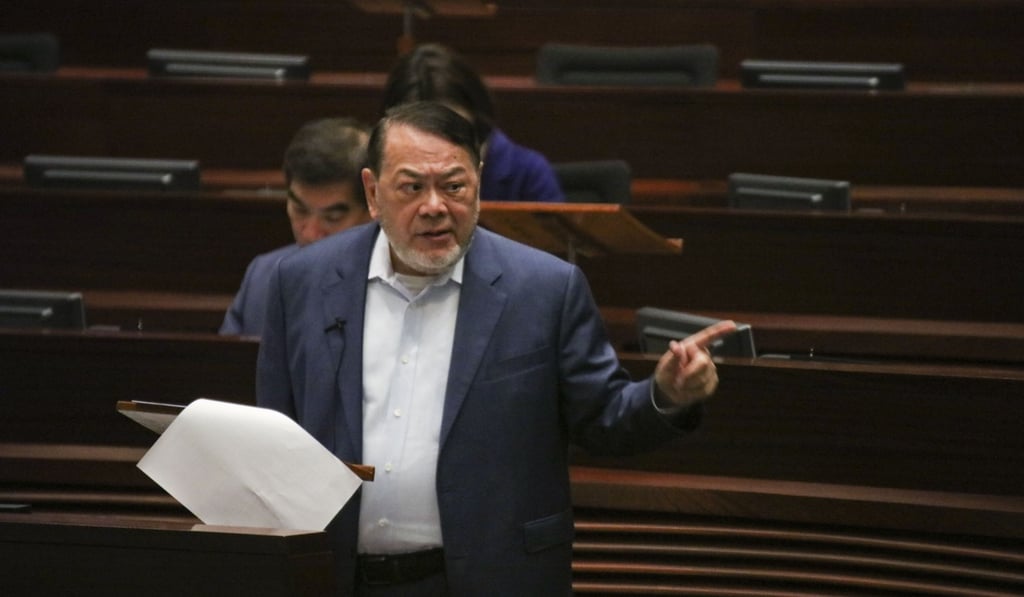Committee chairman Abraham Razack tabled the report to the Legislative Council. Photo: Felix Wong
