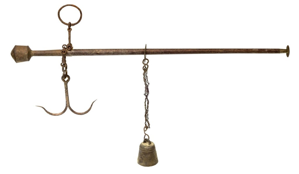 An antique Asian steelyard balance.