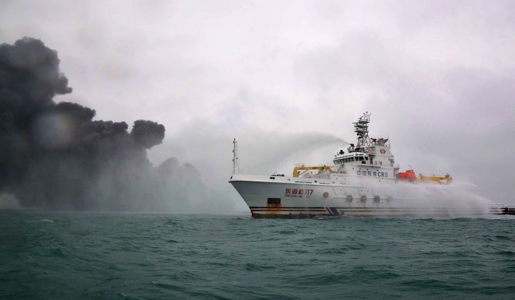 A Chinese firefighting vessel sprays water on the burning oil tanker Sanchi at sea off the coast of eastern China. Photo: transport Ministry of China