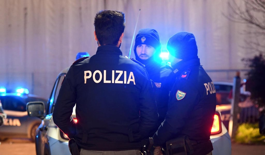 Italian police during operation “China truck” in Prato, Italy, on Thursday. Photo: EPA