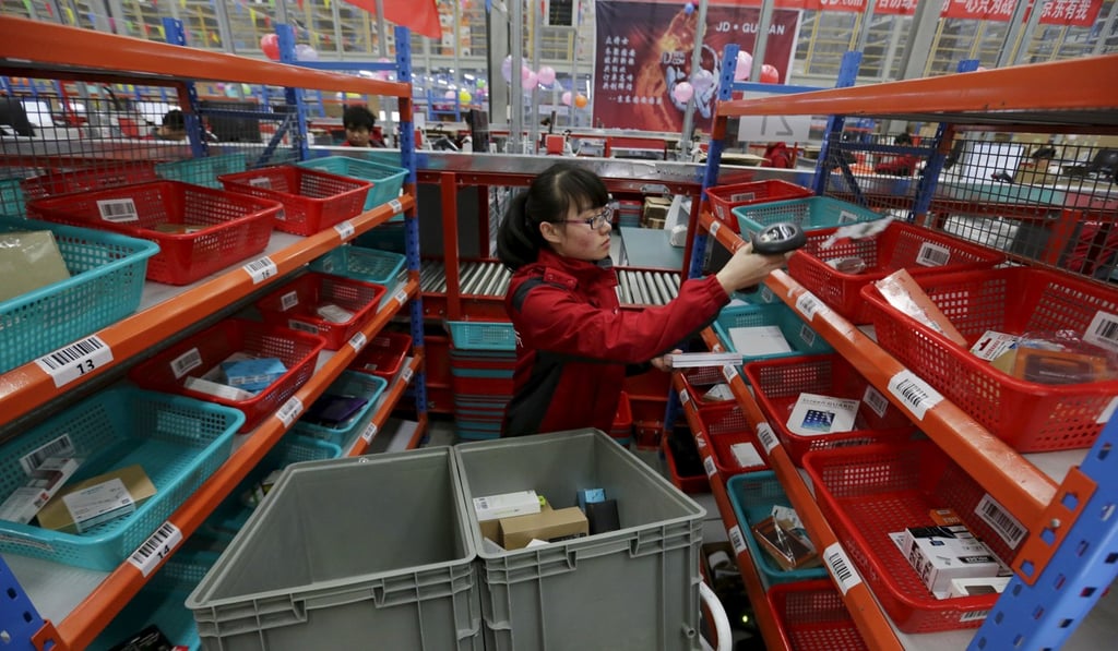 An employee at a JD.com logistic centre in Langfang, Hebei province. Photo: Reuters