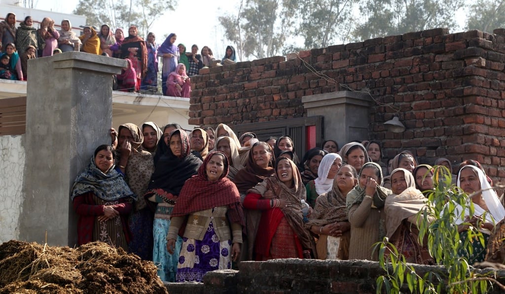 Relatives mourn the death of Sahil Kumar who was killed by alleged gun fire from the Pakistani side of the disputed Kashmir border in the village of Ranbir Singh Pura about 25 km from Jammu. Photo: EPA-EFE