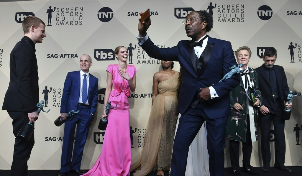 The winners of Outstanding Performance by a Cast in a Motion Picture for “Three Billboards Outside Ebbing, Missouri”, pose in the press room at the 24th Annual Screen Actors Guild Awards. Photo: Agence France-Presse
