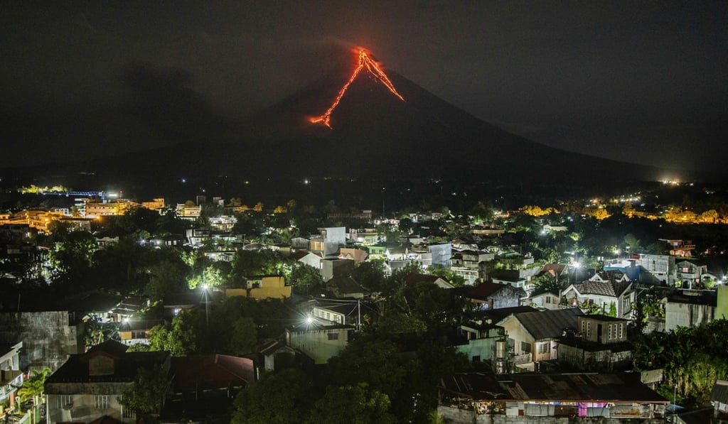 Lava seeps down the slopes of the Mayon volcano. Photo: AP Lava seeps down the slopes of the Mayon volcano. Photo: AP