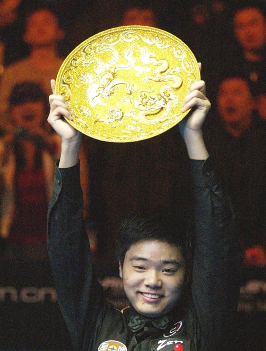 China’s Ding celebrates his win in Beijing in 2005. Photo: AP