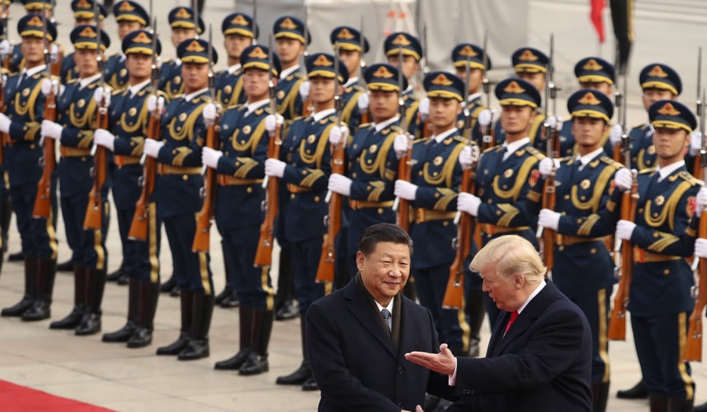 Chinese President Xi Jinping with US counterpart Donald Trump at the Great Hall of the People in Beijing. Photo: AP
