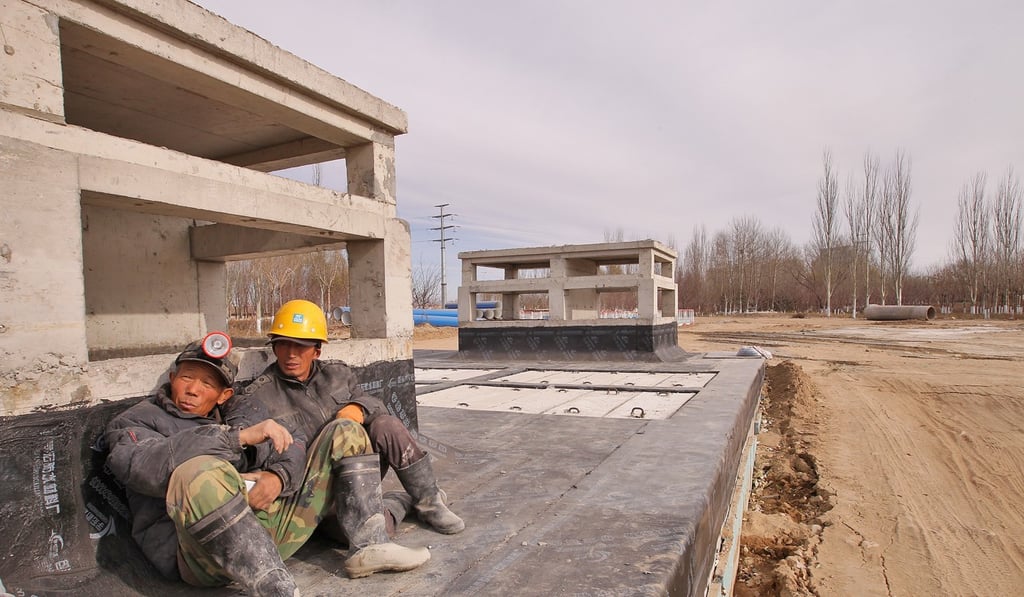 Fitch has downgraded its internal assessment of the creditworthiness of Inner Mongolia. (Pictured) Work on a metro station is suspended in Baotou last November. Photo: Simon Song