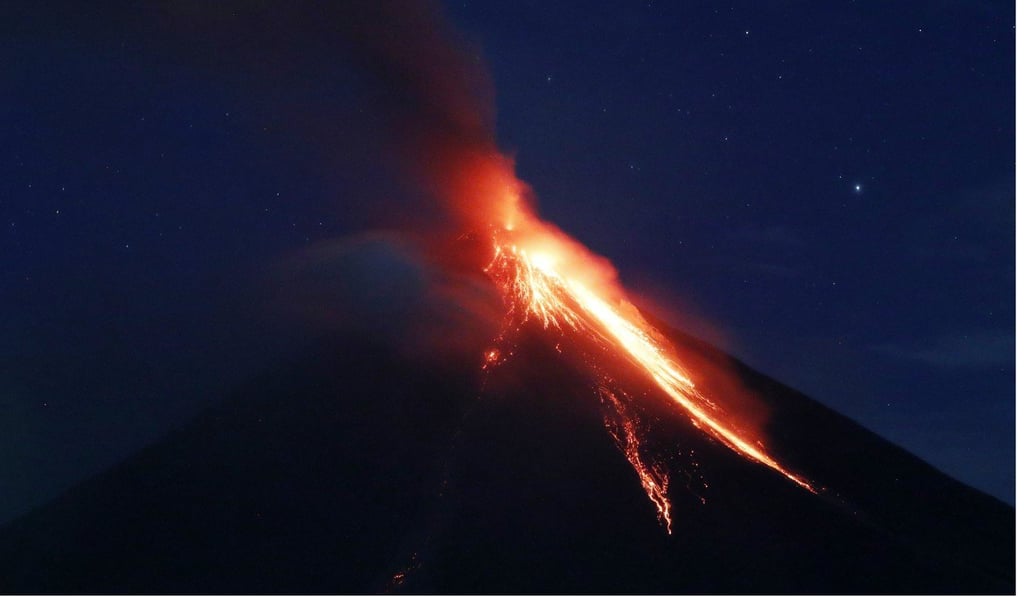 Mayon Volcano spews ash and lava on Tuesday. Photo: EPA