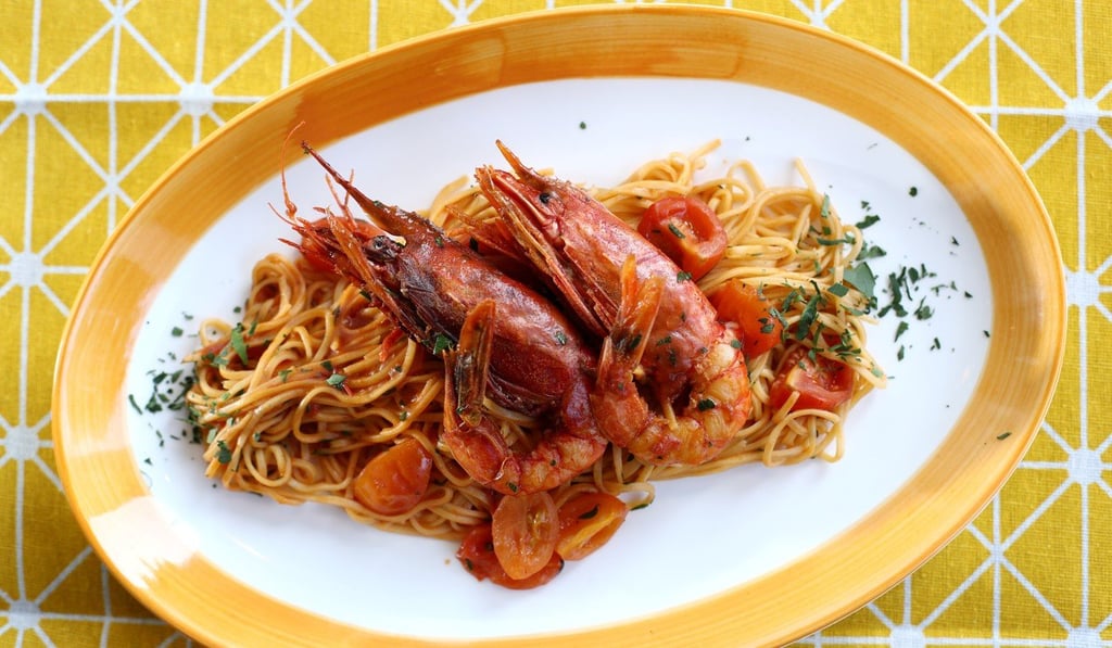 Handmade tagliolini with Sicilian sweet red prawns and fresh cherry tomatoes. Photo: Nora Tam