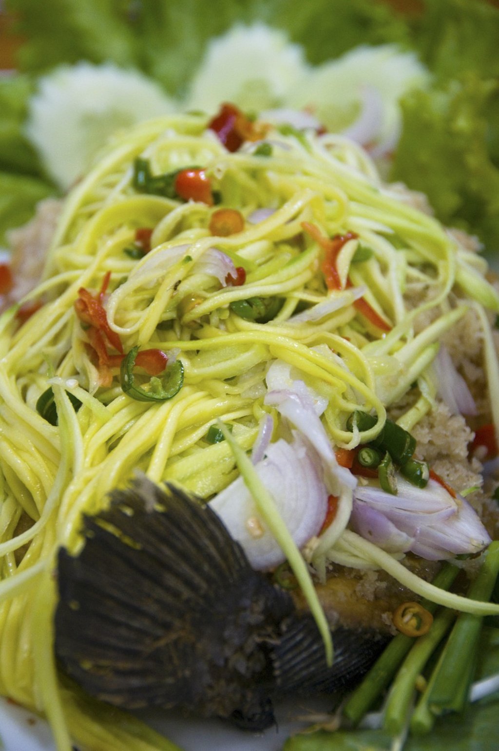 Snakehead fish with mango salad. Picture: Alamy