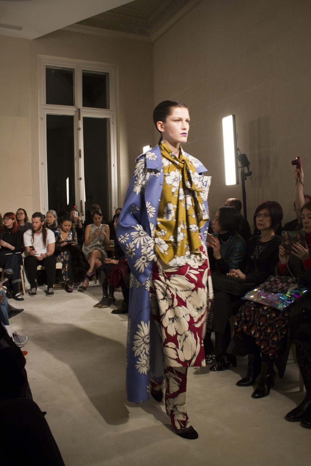 This Valentino look features loud floral prints. Photo: Akim Mousterou This Valentino look features loud floral prints. Photo: Akim Mousterou