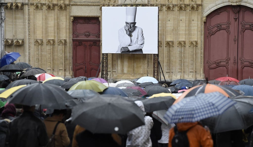 Chefs gather outside Saint-Jean Cathedral in Lyon. Photo: AFP