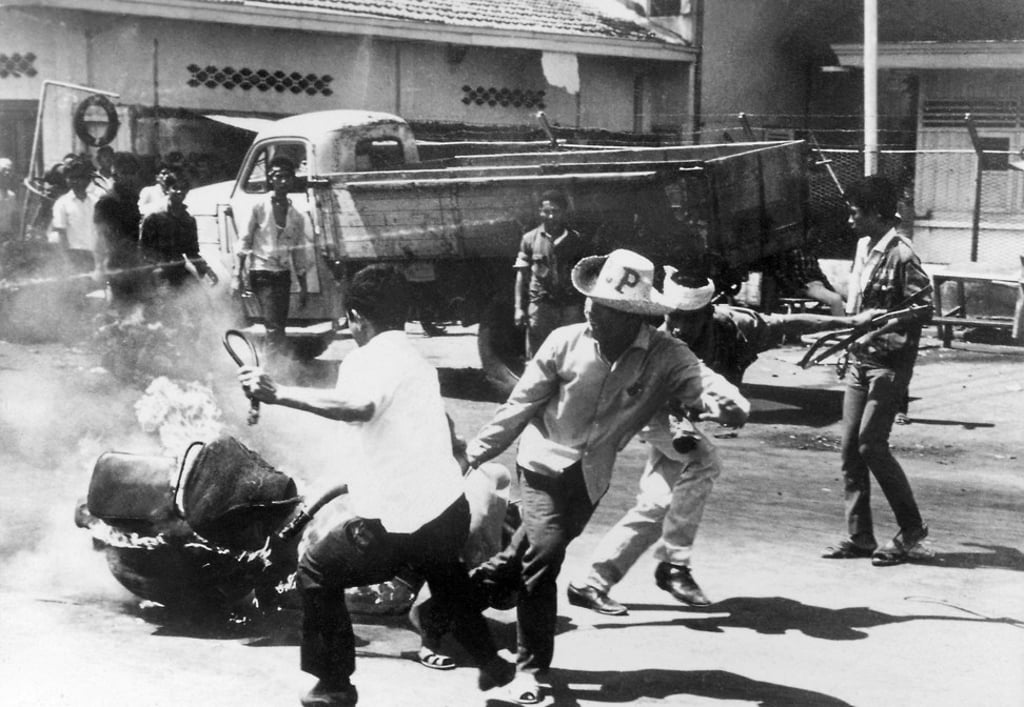 Young Indonesians stage a violent anti-Chinese demonstration in front of the Chinese embassy in Jakarta in 1967. Picture: AFP