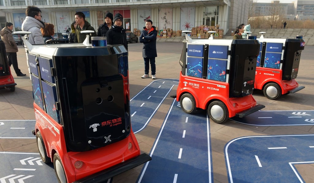 Driverless delivery vehicles for Chinese e-commerce company JD.com are tested in Tianjin. Photo: AFP