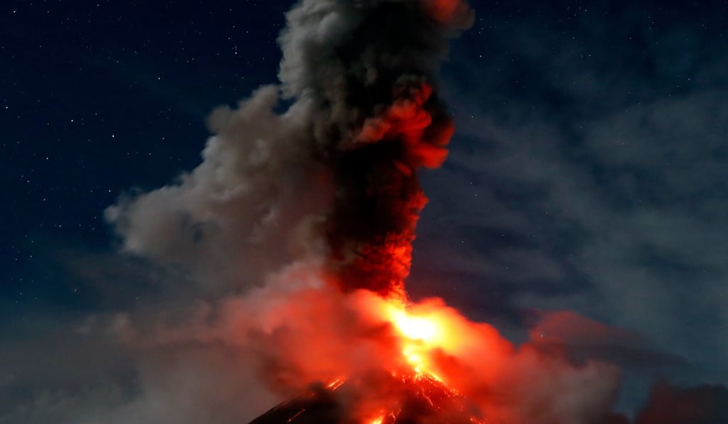 Mount Mayon shot ash, lava and superheated rocks 5km into the air this week. Photo: EPA Mount Mayon shot ash, lava and superheated rocks 5km into the air this week. Photo: EPA