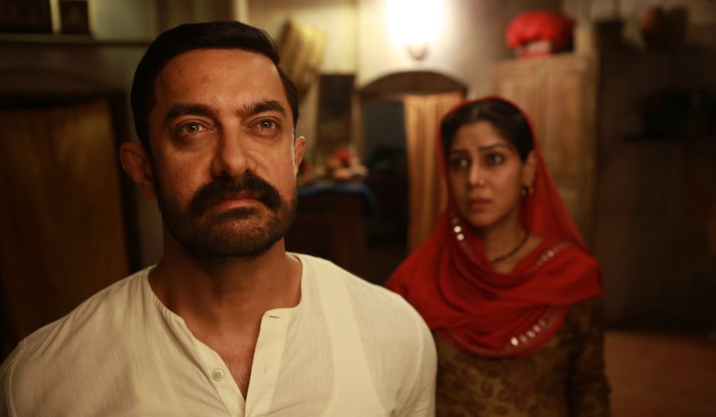 Aamir Khan and Sakshi Tanwar play husband and wife in Dangal. Photo: Handout