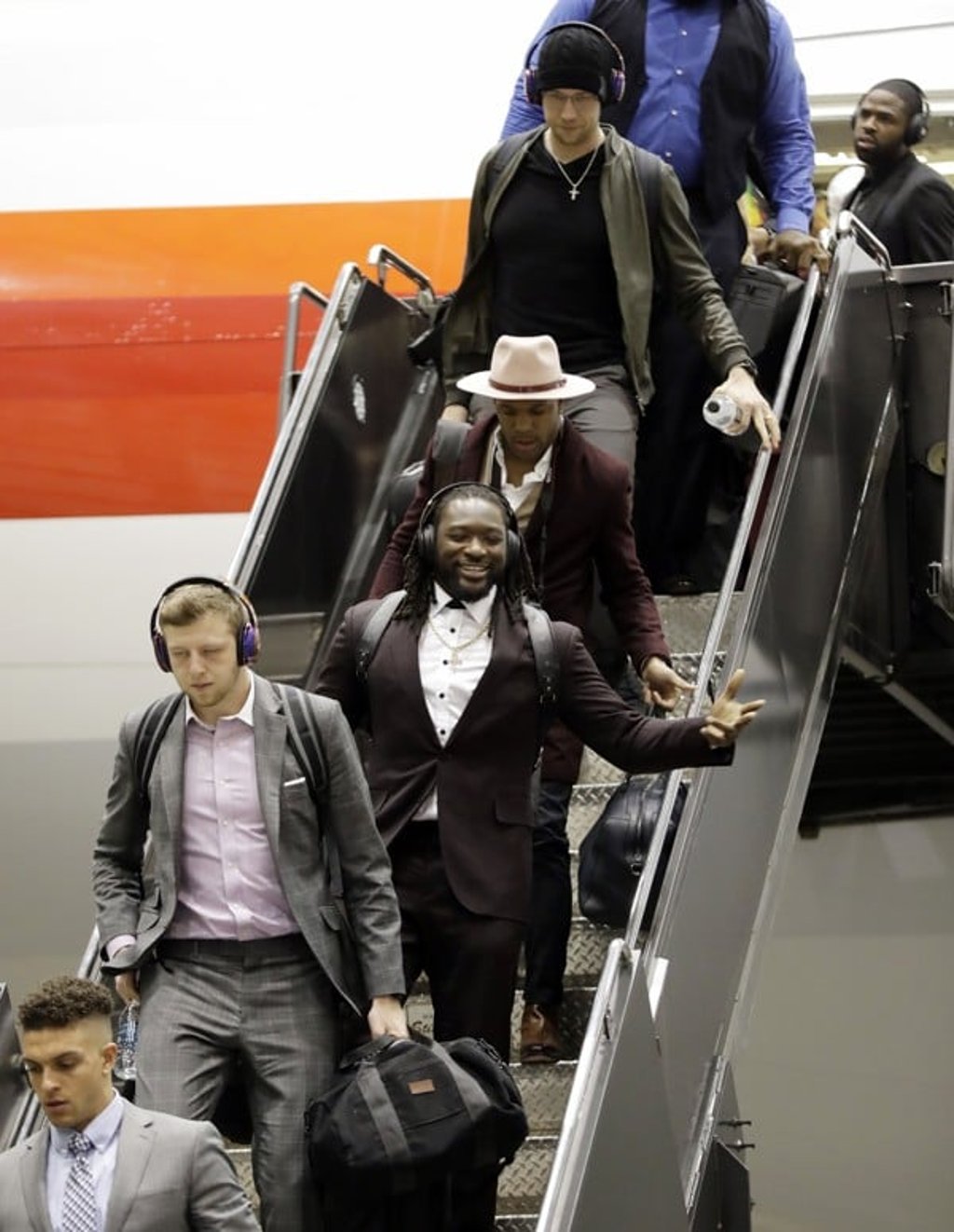 Philadelphia Eagles quarterback Nate Sudfeld [second bottom] is followed by running back LeGarrette Blount, linebacker Mychal Kendricks, and quarterback Nick Foles, as they arrive for the NFL Super Bowl. Photo: AP