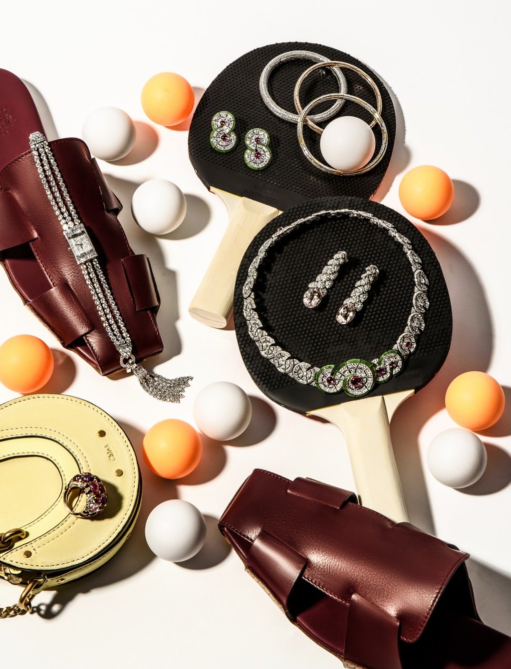 Cartier, earrings and matching necklace in platinum with jade, rubies and diamonds, prices on request, ring (bottom left) in pink gold with diamonds, rubellites, garnets, amethysts and onyx, price on request; Nirav Modi, Embrace Classic White Gold Bangle with white diamonds (top), HK$335,000, Classic Pink Gold Bangle with baby pink diamonds (middle), HK$350,000, Classic Dual Tone Bangle in white and yellow gold links, HK$58,000; Boucheron, Reflet Pompon watch in white gold with diamonds and removable pompon, HK$2,450,000, Glycine pendant earrings in white gold with pink oval morganites, HK$423,000; Hermes, shoes, HK$7,000; Chloe, bag, HK$7,390.