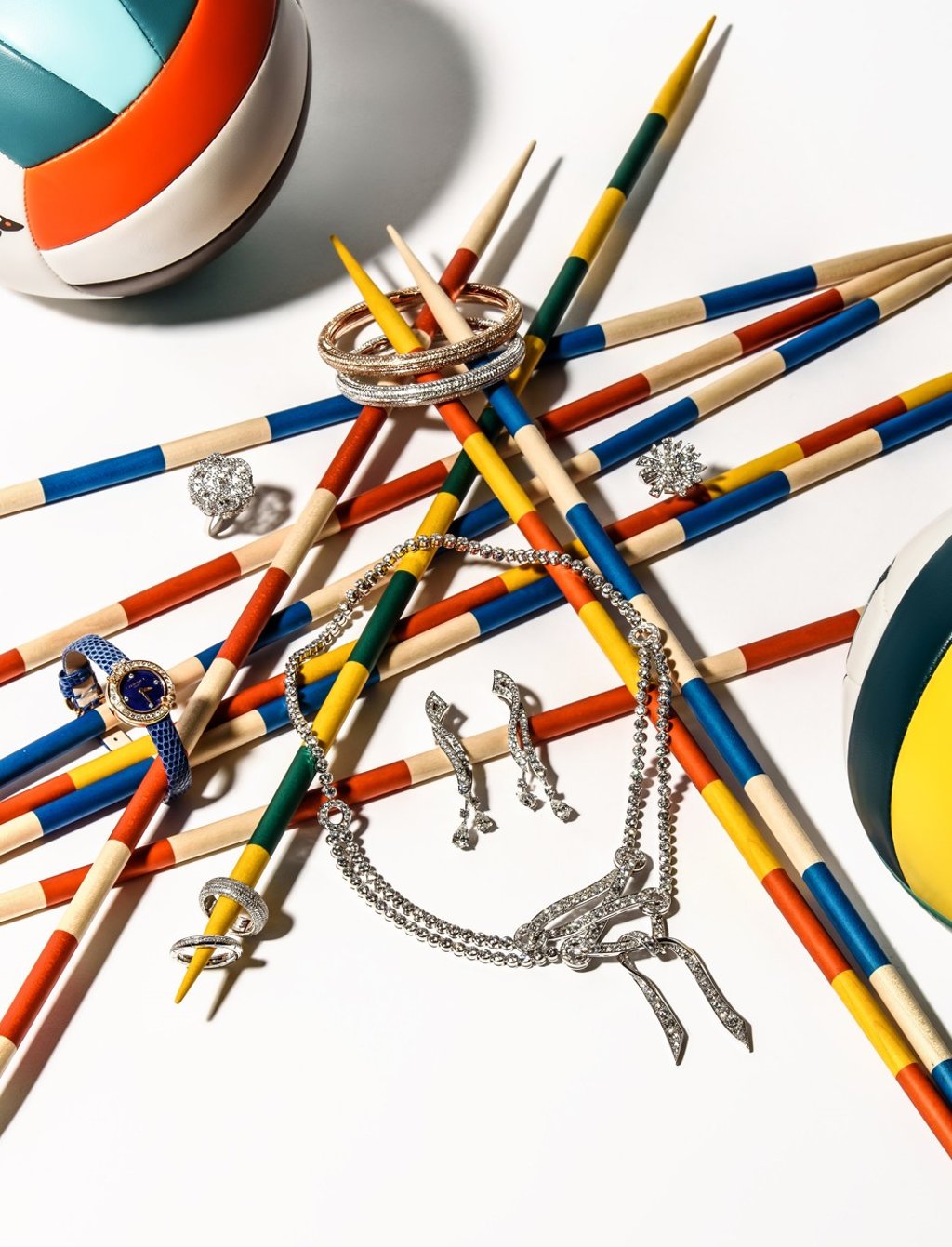 Nirav Modi, Embrace Classic bangle (top) in pink gold with diamonds, HK$359,000, Classic bangle (below) in white gold with diamonds, HK$335,000, Celestial ring (left) in white gold with diamonds, HK$160,000, Classic White Gold Ring with diamonds (bottom), HK$76,000, Slim White Gold Ring with diamonds (bottom), HK$25,000; Piaget, Limelight Necklace, HK$2,340,000, Dolce Sera ring in white gold with diamonds, HK$630,000; De Beers, Phenomena Stream earrings in white gold with diamonds, HK$466,000; Chaumet, Hortensia Eden watch in rose gold with diamonds and lapis lazuli dial; HK$116,000; Hermes, Mikado stick, HK$10,100.