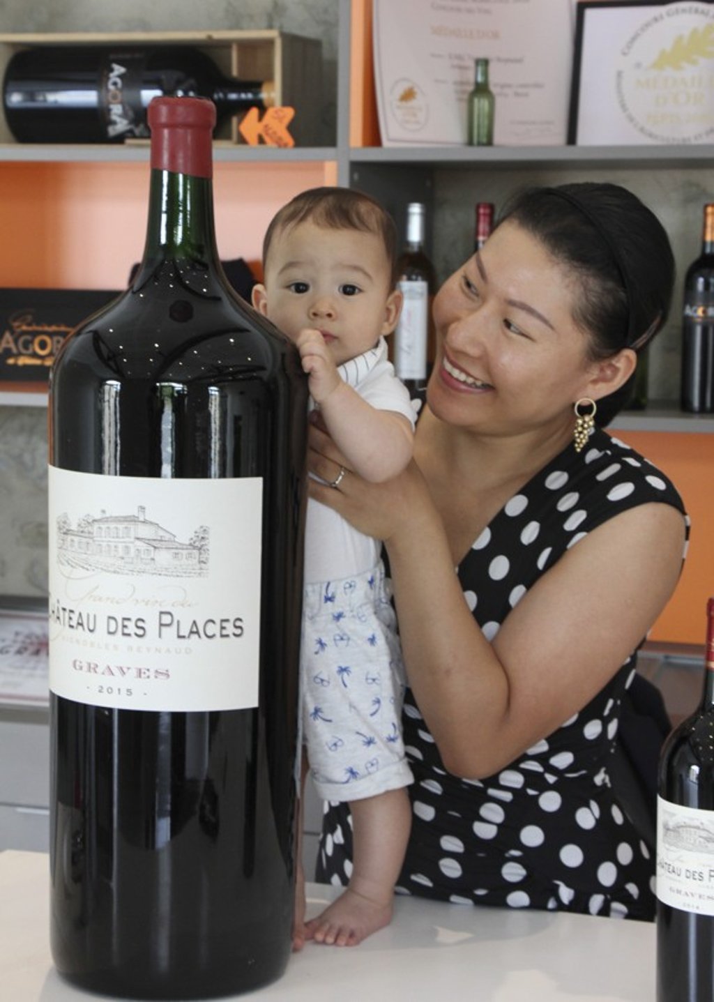 Wu Dan, who hails from Zhengzhou, Henan province, and son César, at Château des Places.