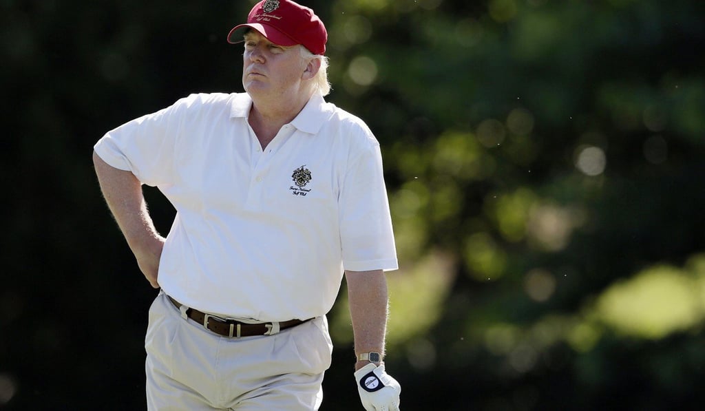 Donald Trump stands on the 14th fairway during a pro-am round of the AT&T National golf tournament at Congressional Country Club in Bethesda, Maryland in 2014. Photo: AP