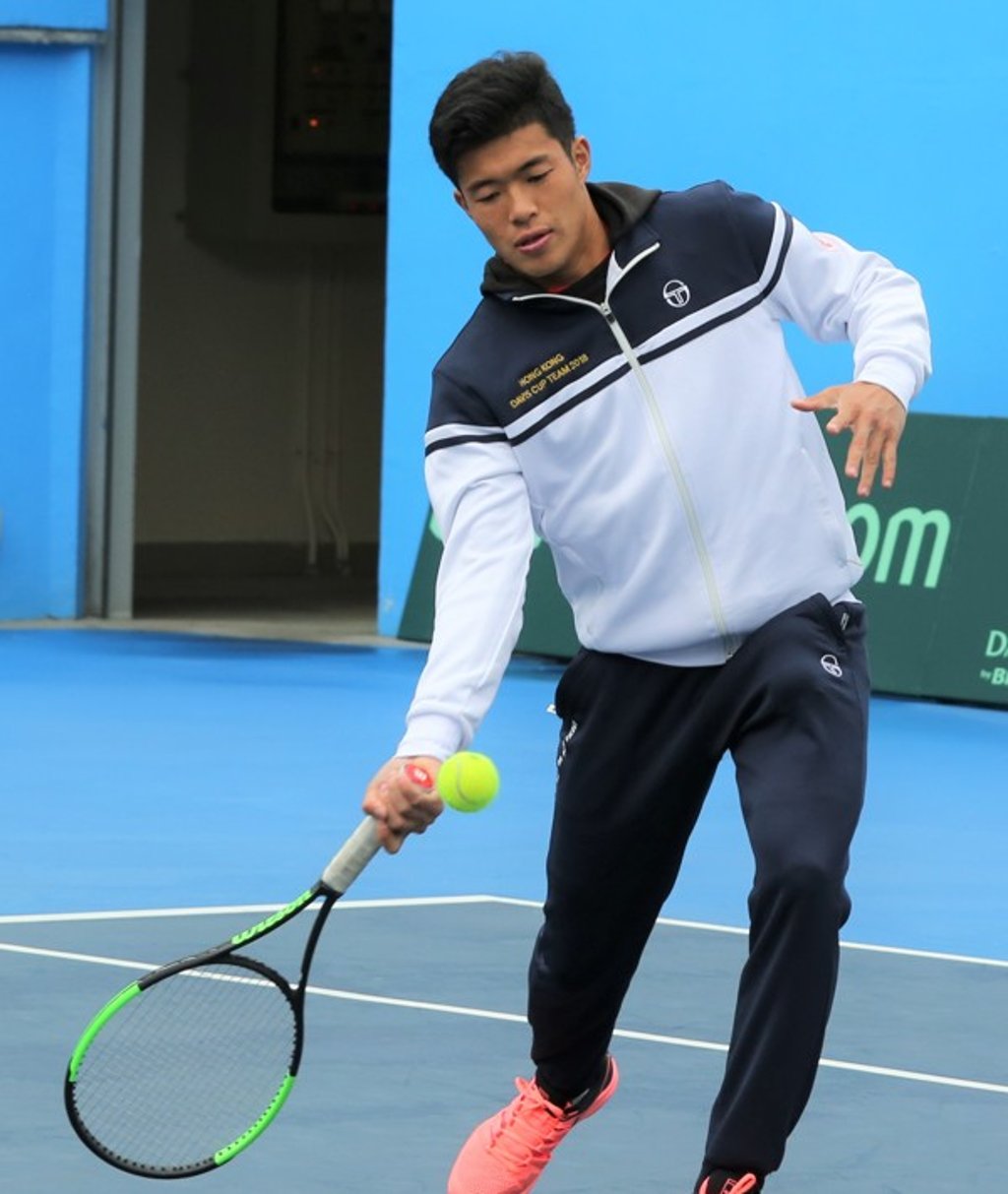 Davis Cup team member Kevin Wong Chun-hun warms up at Victoria Park’s centre court. Photo: Chan Kin-wa