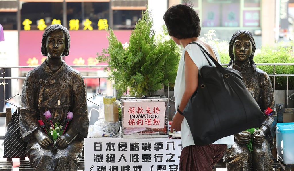 Statues of two comfort women were placed near the Japanese consulate in Hong Kong at Exchange Square last August by the Action Committee for Defending the Diaoyu Islands. Photo: Nora Tam