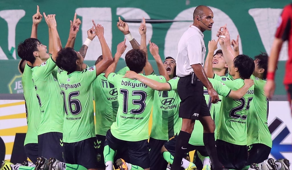 South Korea’s Jeonbuk Hyundai Motors players celebrate a goal in the 2016 AFC Champions League. Photo: AFP