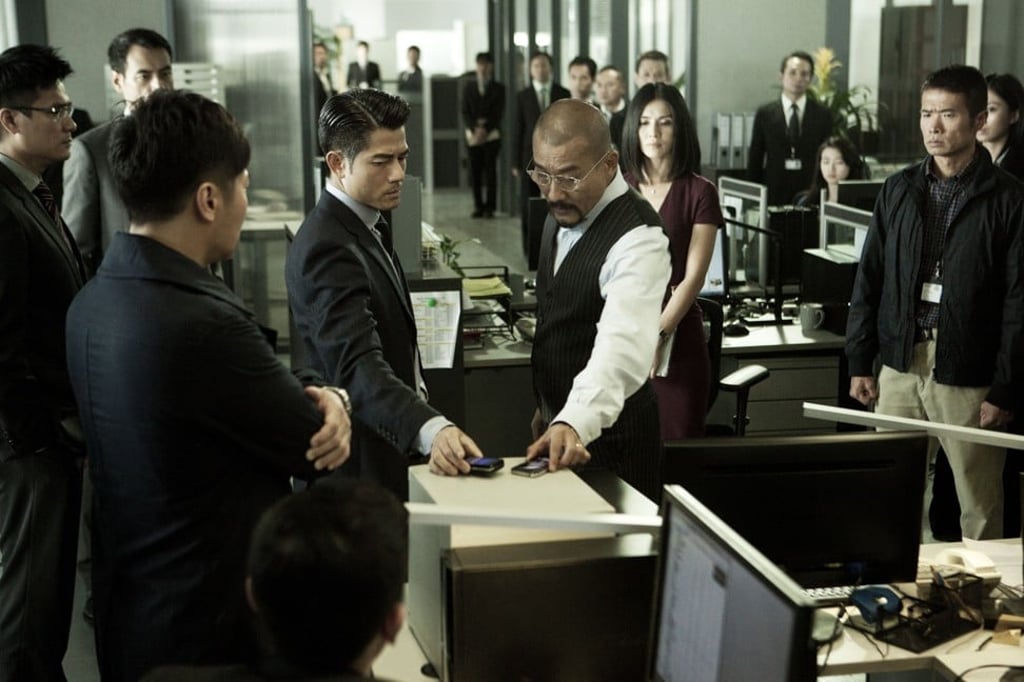 Aaron Kwok Fu-shing (centre, left) and Leung (centre, right) in 2012 police drama Cold War.