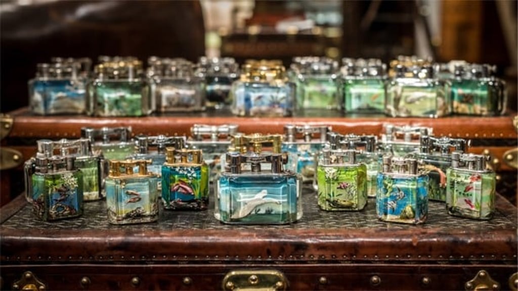 Timothy Oulton's Aquarium and Giant Aviary Dunhill lighters. The collection will be displayed exclusively at Harrods. Photos: Timothy Oulton Timothy Oulton's Aquarium and Giant Aviary Dunhill lighters. The collection will be displayed exclusively at Harrods. Photos: Timothy Oulton