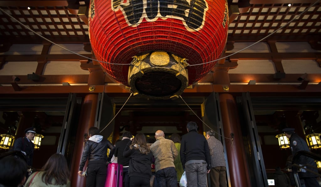 Tourists wait to enter the Sensoji Temple in the Asakusa district of Tokyo, Japan. YouTube blogger Logan Paul recently mocked people who tossed coins into the shrine’s offering box. Photo: Bloomberg