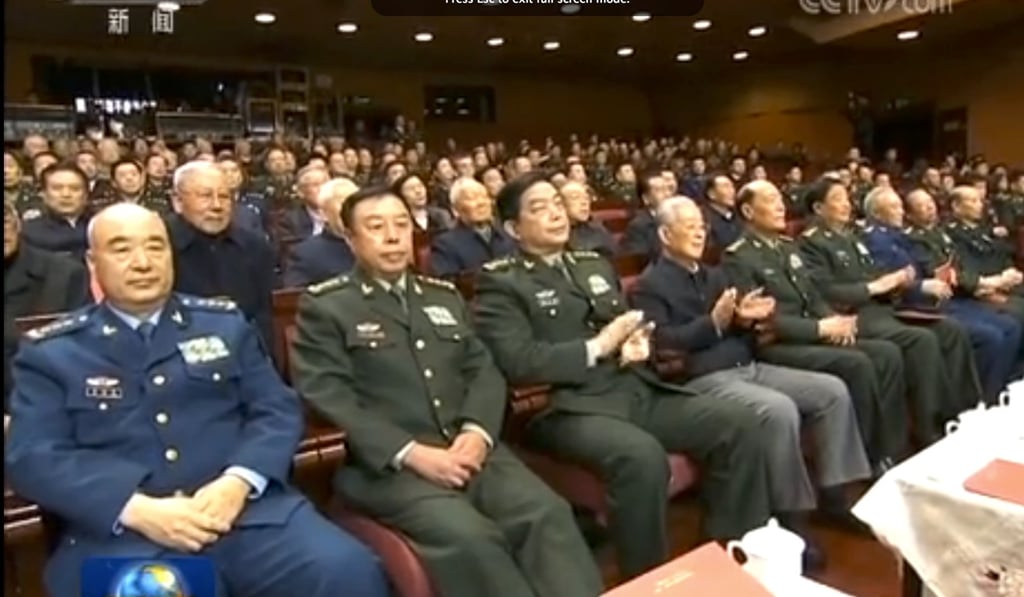 Former general Fan Changlong (front, second from left) attends a Lunar New Year event for veterans that President Xi Jinping also appeared at. Photo: CCTV