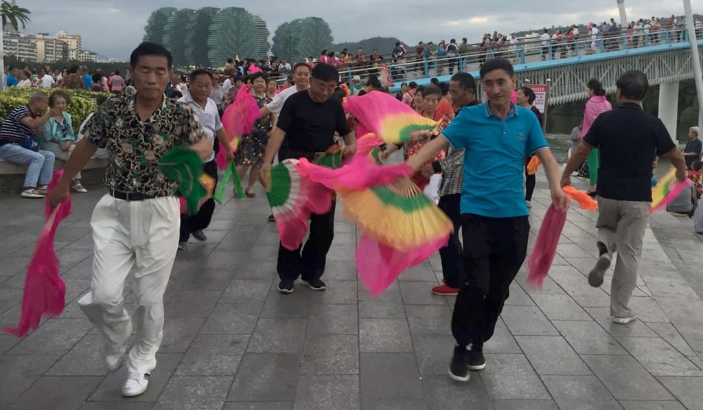 Dancing at Bailu park is a popular pastime for retirees in Sanya. Photo: Alice Yan