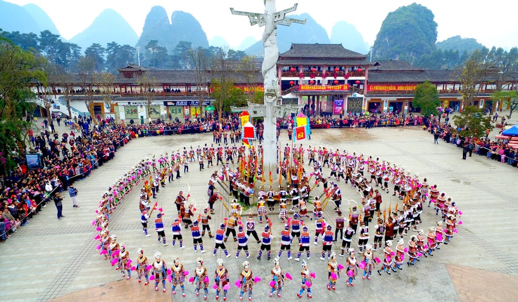People dance to celebrate the traditional new year festival of the Miao ethnic group in Rongshui county, Guangxi. Photo: Xinhua
