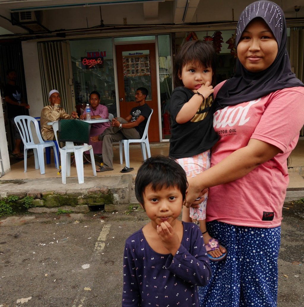 Habibah Abdullah, with daughters Rihana, five, and Fasanah, two.