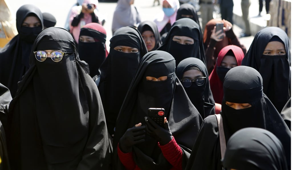 Muslim activists attend an anti-LGBT rally in Banda Aceh, Indonesia. Aceh, which is governed has established LGBT (lesbian, gay, bisexual, and transgender) practices as a violation of sharia law. Photo: EPA Muslim activists attend an anti-LGBT rally in Banda Aceh, Indonesia. Aceh, which is governed has established LGBT (lesbian, gay, bisexual, and transgender) practices as a violation of sharia law. Photo: EPA
