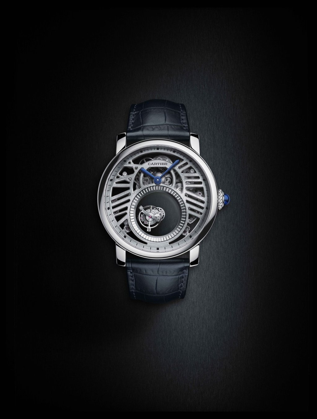 Cartier. Set in platinum, the Rotonde de Cartier Skeleton Mysterious Double Tourbillon Watch features skeletonised bridges in the shape of Roman numerals and blued steel sword-shaped hands. Price on request.