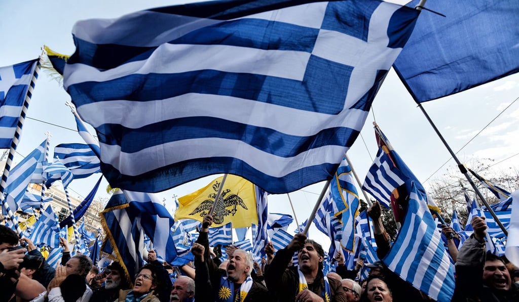 People take part in a demonstration to urge the government not to compromise in the festering name row with neighbouring Macedonia, at the Syntagma Square in Athens, on Sunday. Photo: AFP