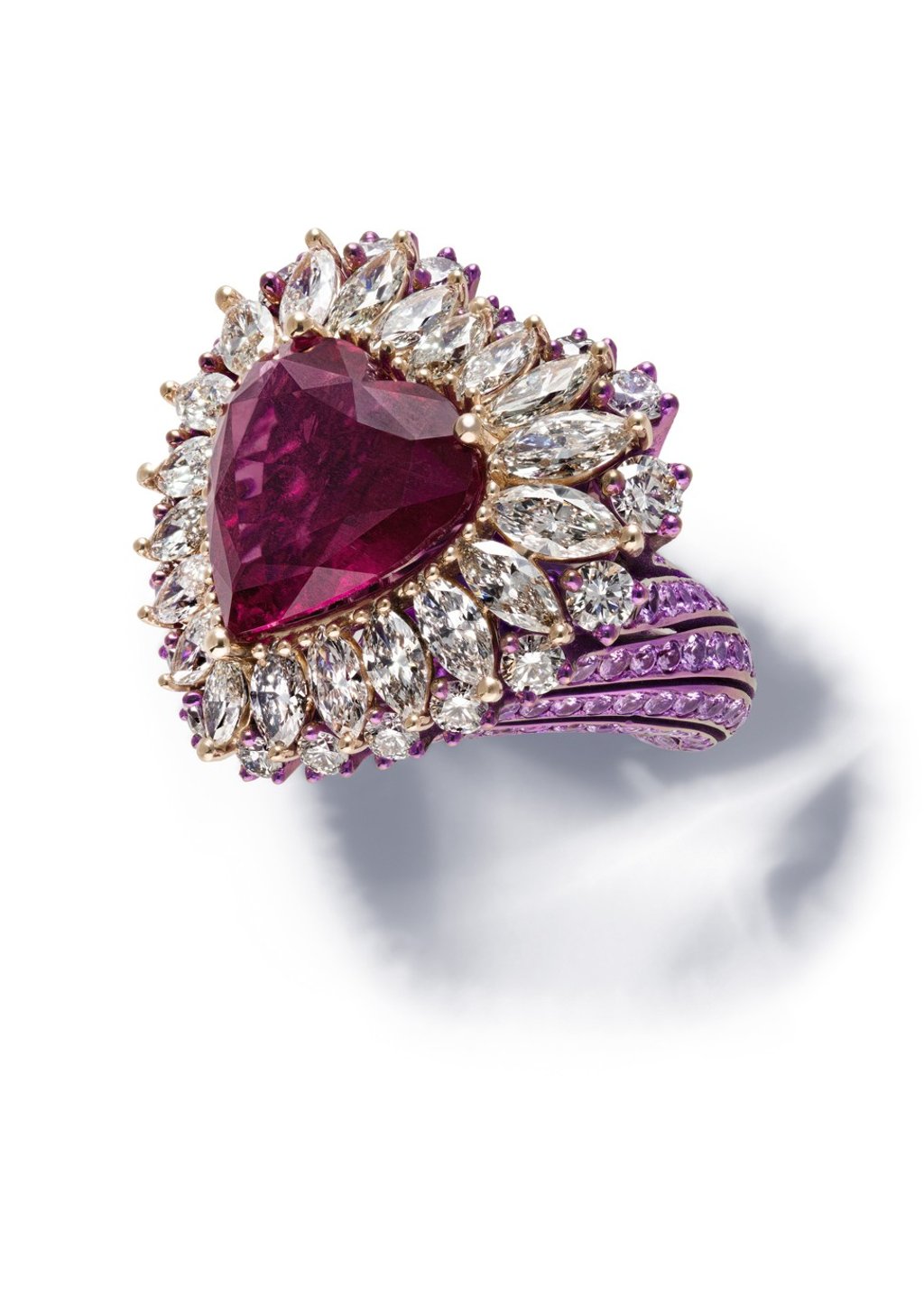 Chopard. Set in 18ct white gold and titanium, the ring features a 10.4ct heart-shaped rubellite, marquise-cut diamonds and brilliant-cut pink sapphires and diamonds. Price on request