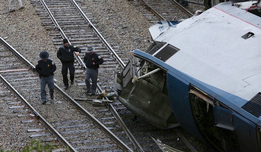 Authorities investigate the scene of a fatal Amtrak train crash in Cayce, South Carolina, on Sunday. Photo: AP
