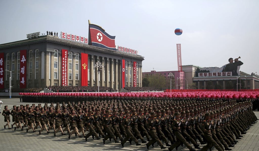 Soldiers march across Kim Il-sung Square during a military parade in Pyongyang in April. North Korea is preparing to stage a major event to mark the 70th anniversary of the founding of its military on February 8, 2018 – just one day before the opening ceremony of the Pyeongchang Winter Olympics in South Korea. Photo: AP Soldiers march across Kim Il-sung Square during a military parade in Pyongyang in April. North Korea is preparing to stage a major event to mark the 70th anniversary of the founding of its military on February 8, 2018 – just one day before the opening ceremony of the Pyeongchang Winter Olympics in South Korea. Photo: AP